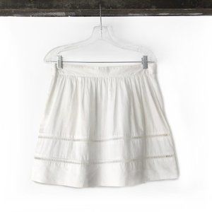 White a-line summer skirt with crochet details